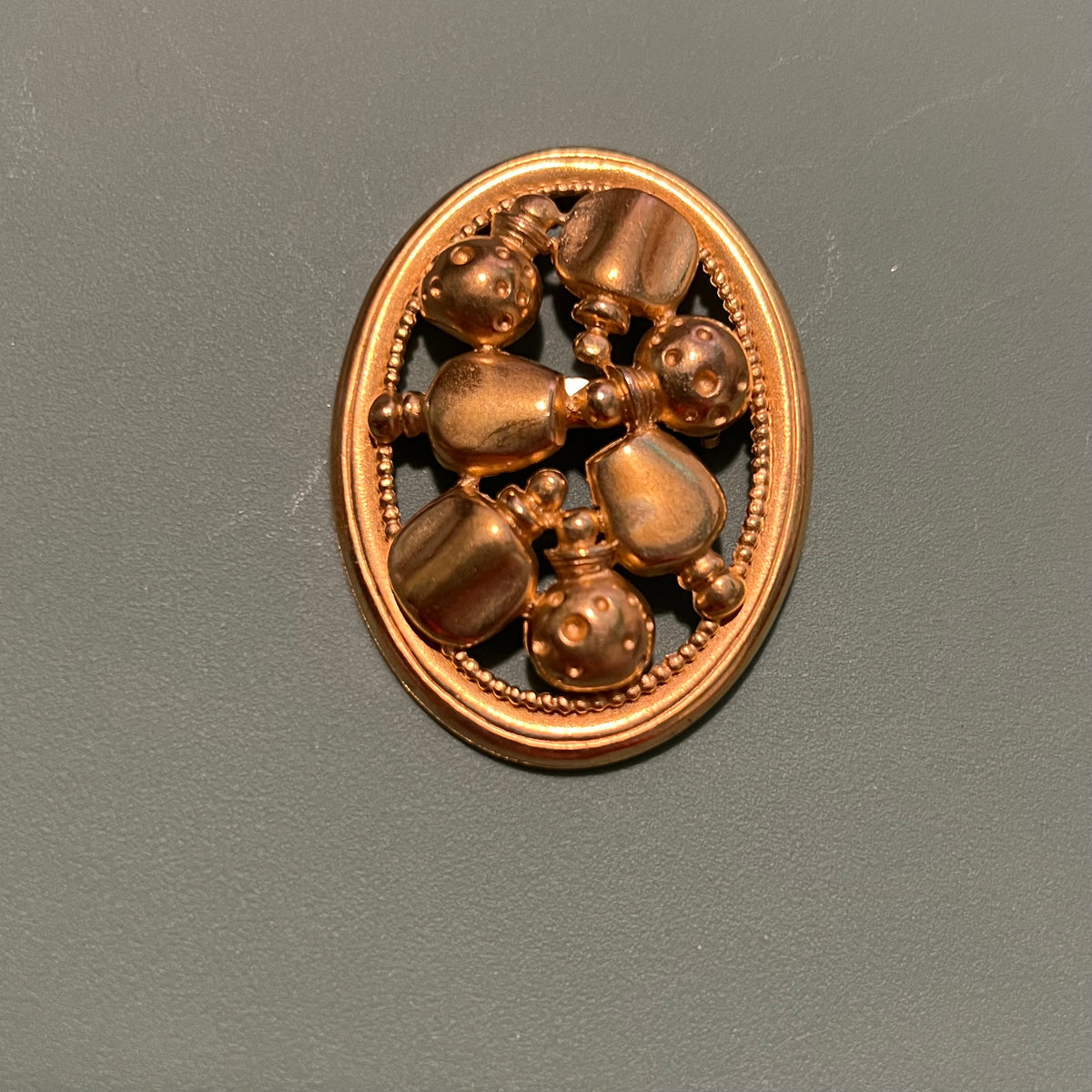 Christian Dior Vintage Perfume Bottle Brooch Gold Tone Oval Figural Designer Pin